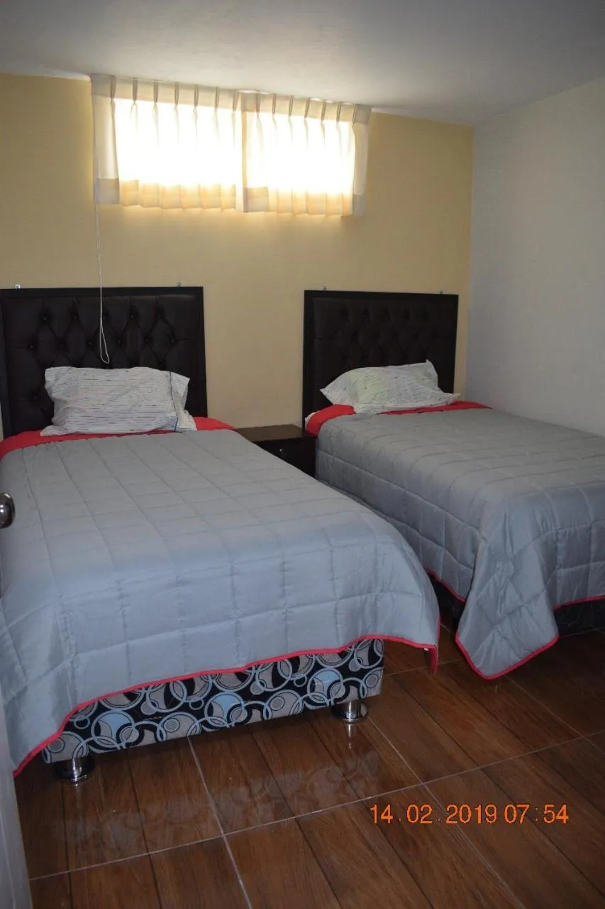 Bed in Arum Qurpawasi Hospedaje