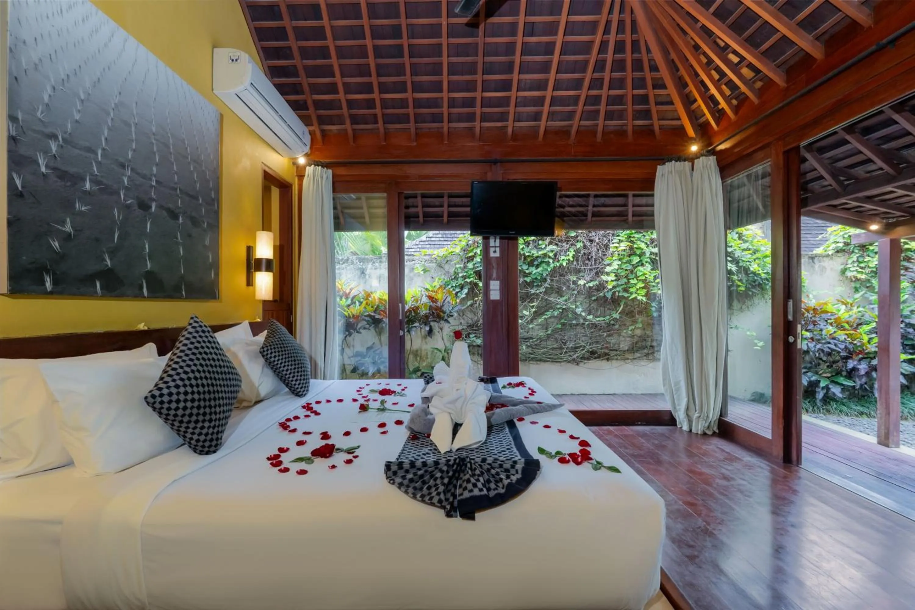 Bedroom in Temuku Ubud Villas