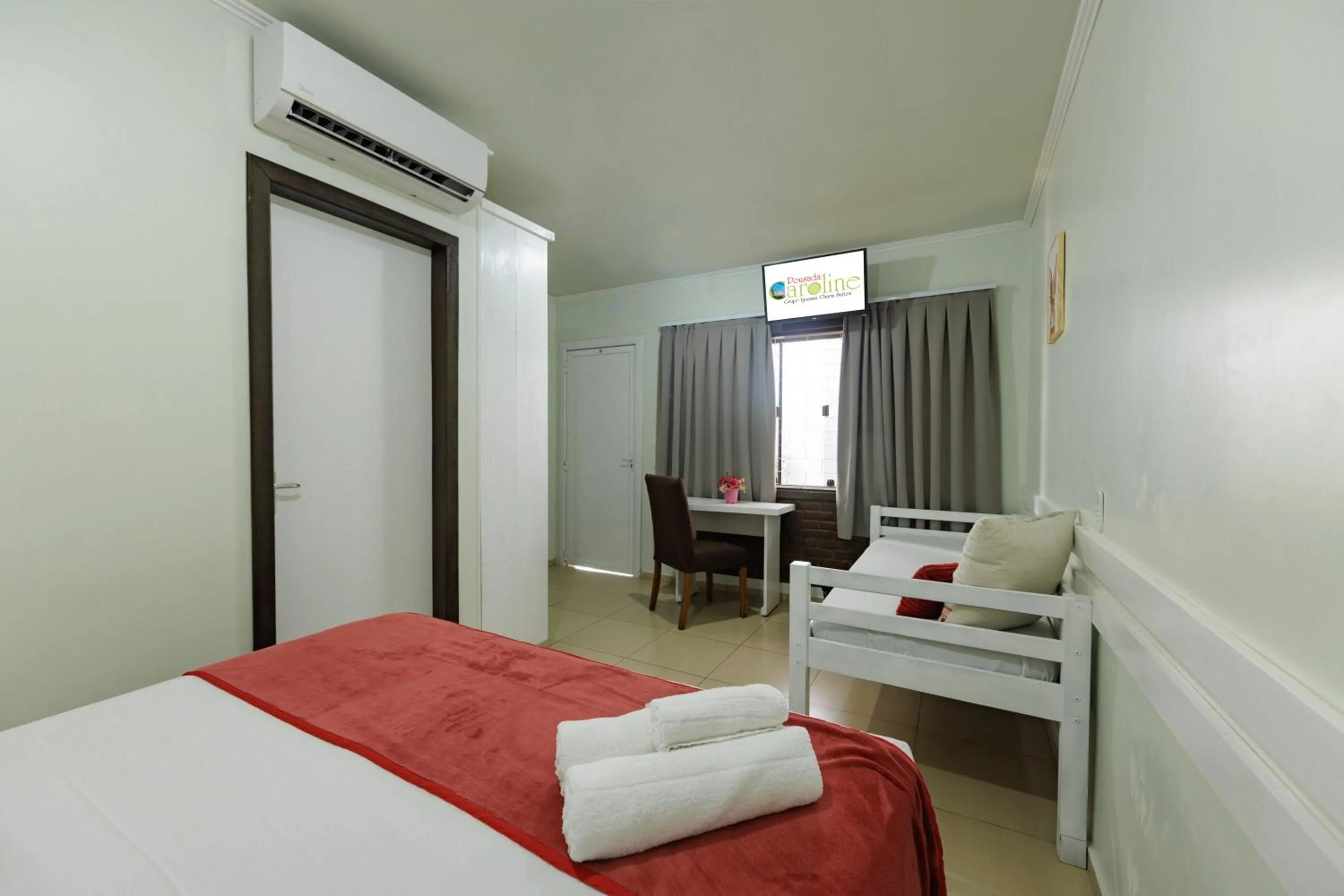 Photo of the whole room, Bed in Pousada Iguassu Charm Suites