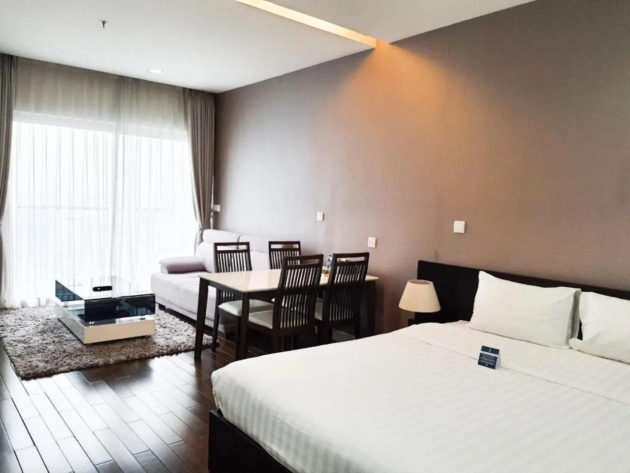 Bed in Lancaster Hanoi Service Apartment