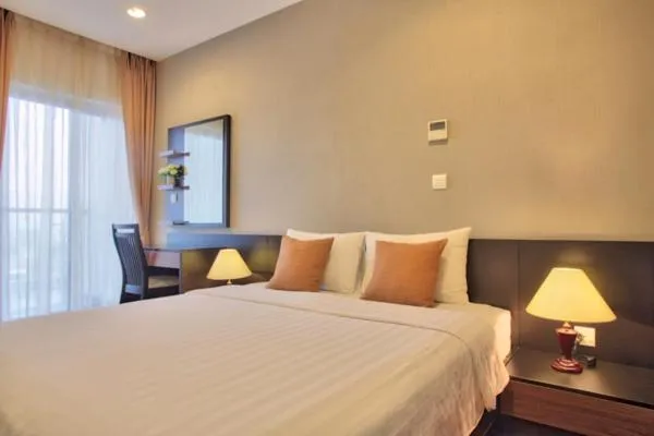 Bed in Lancaster Hanoi Service Apartment