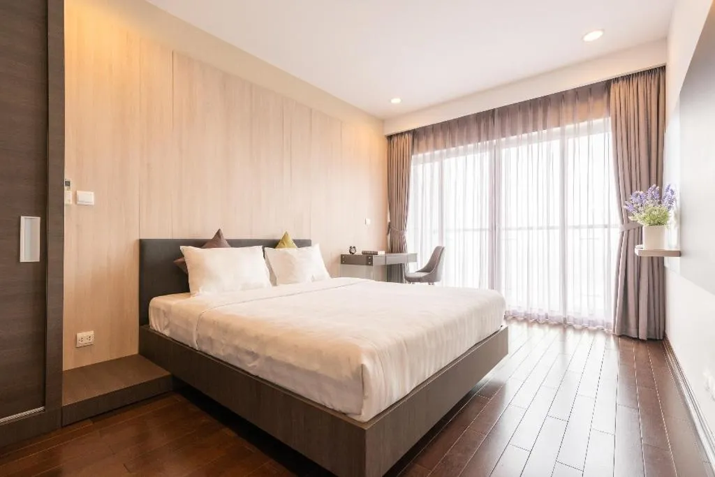 Bed in Lancaster Hanoi Service Apartment