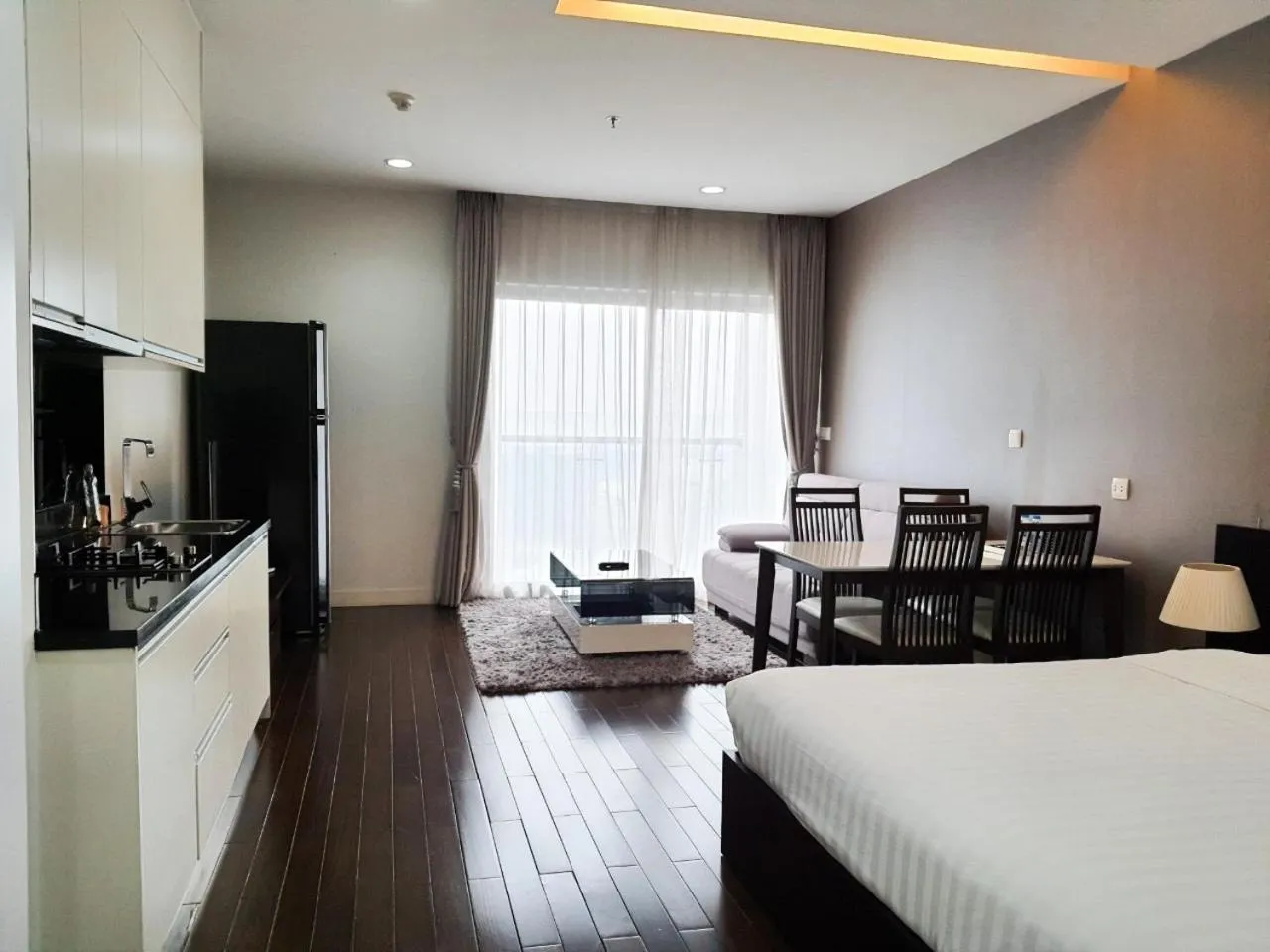 Bed in Lancaster Hanoi Service Apartment