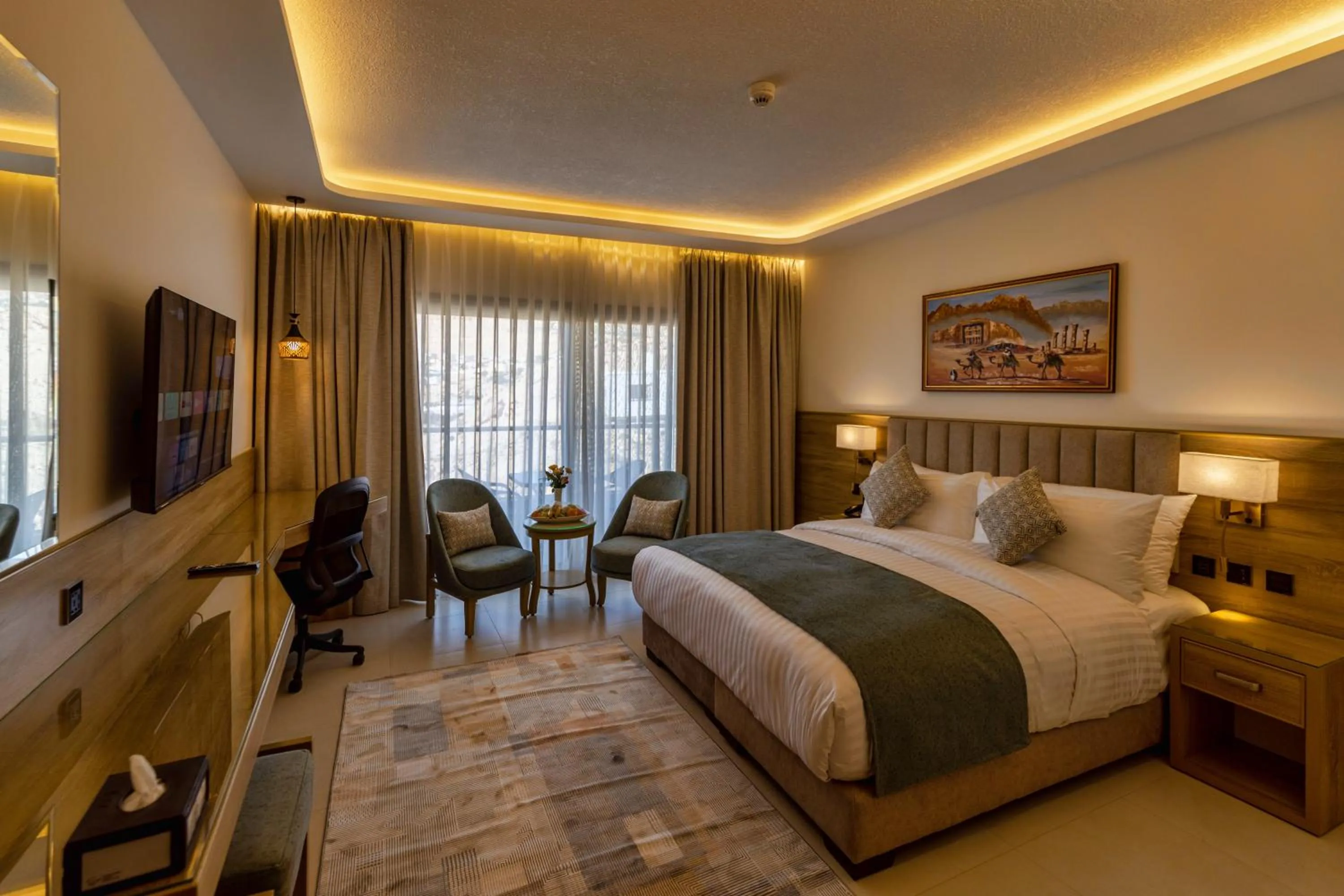 Communal lounge/ TV room, Bed in Petra Legacy Luxury