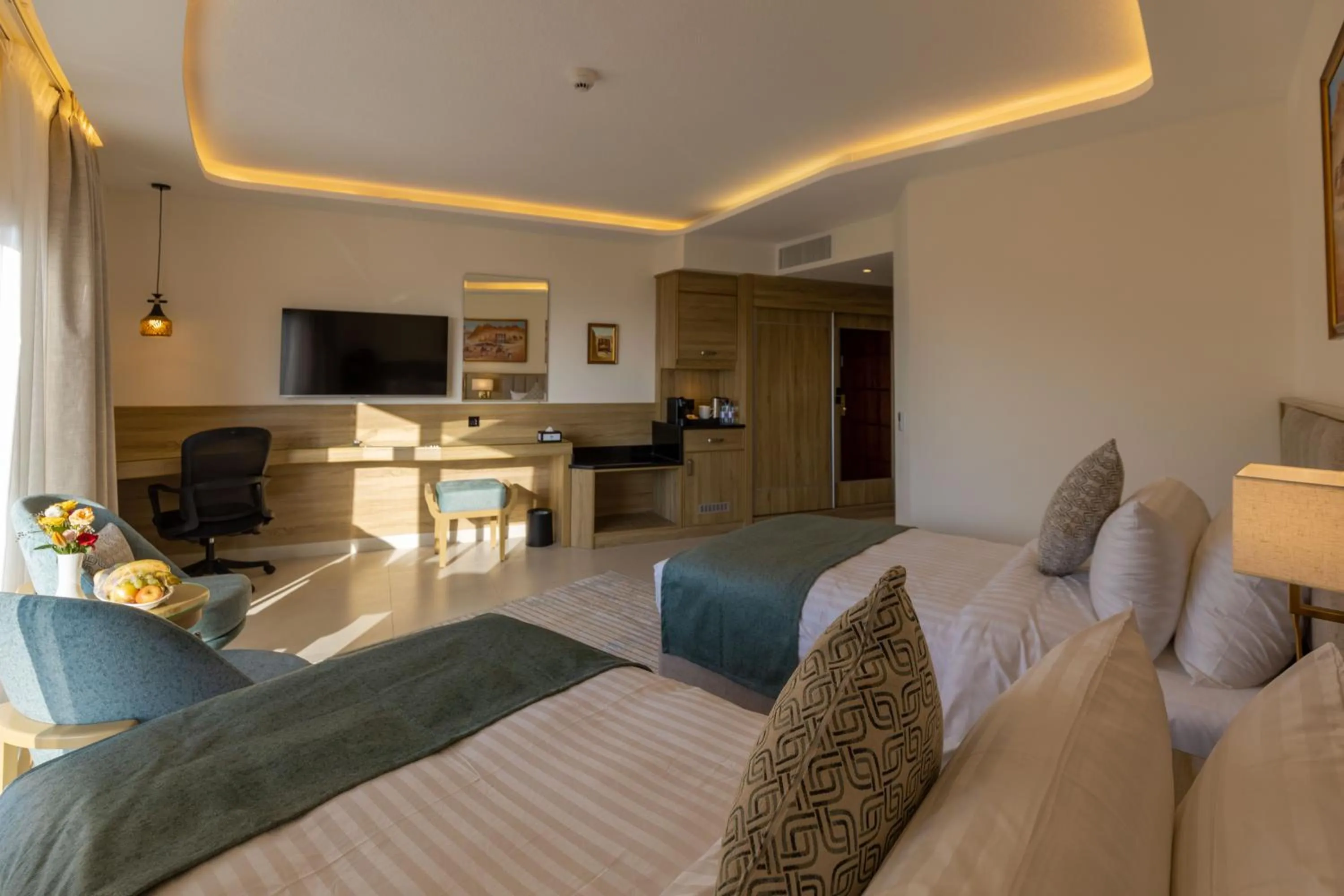Communal lounge/ TV room, Bed in Petra Legacy Luxury