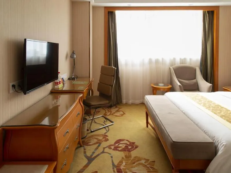 Bed in Vienna Hotel Shanghai Yangpu Wujiaochang