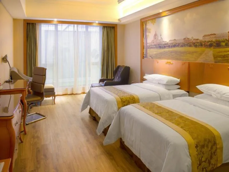 Bed in Vienna Hotel Shanghai Yangpu Wujiaochang