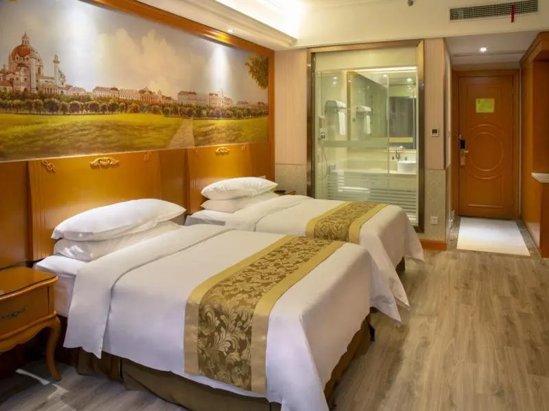 Bed in Vienna Hotel Shanghai Yangpu Wujiaochang