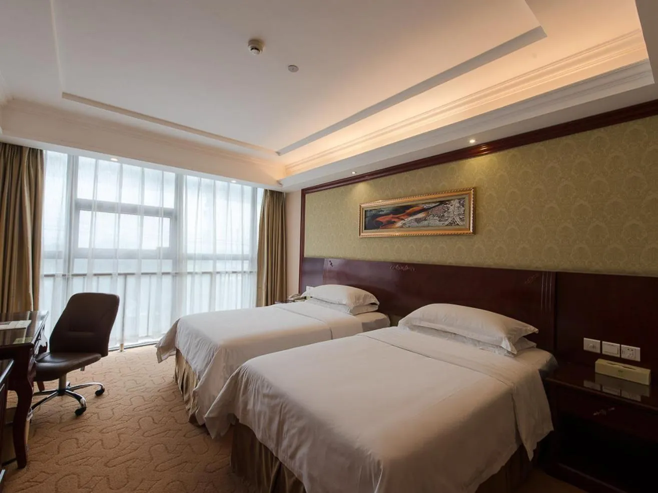 Bed in Vienna Hotel Shanghai Hongqiao Airport Center