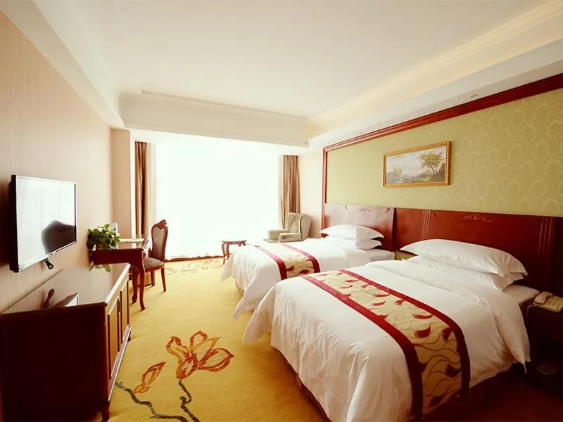 Bed in Vienna Hotel Shanghai Jiading New City