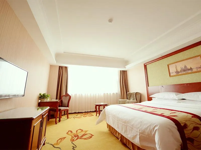 Bed in Vienna Hotel Shanghai Jiading New City