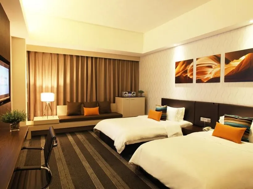 Bed in Vienna International Hotel Changzhou Railway Station