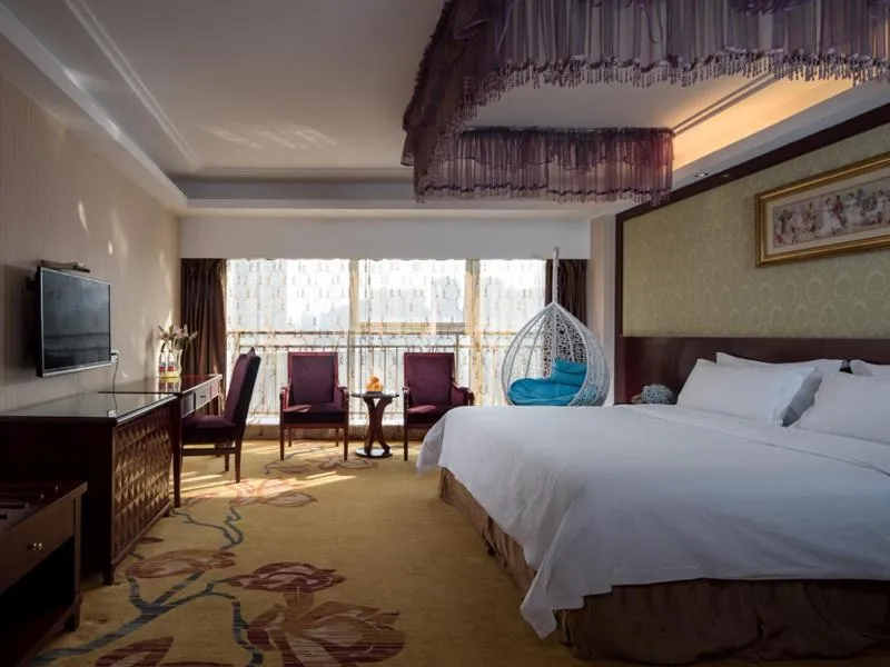 Bed in Vienna International Hotel Changzhou Hutang