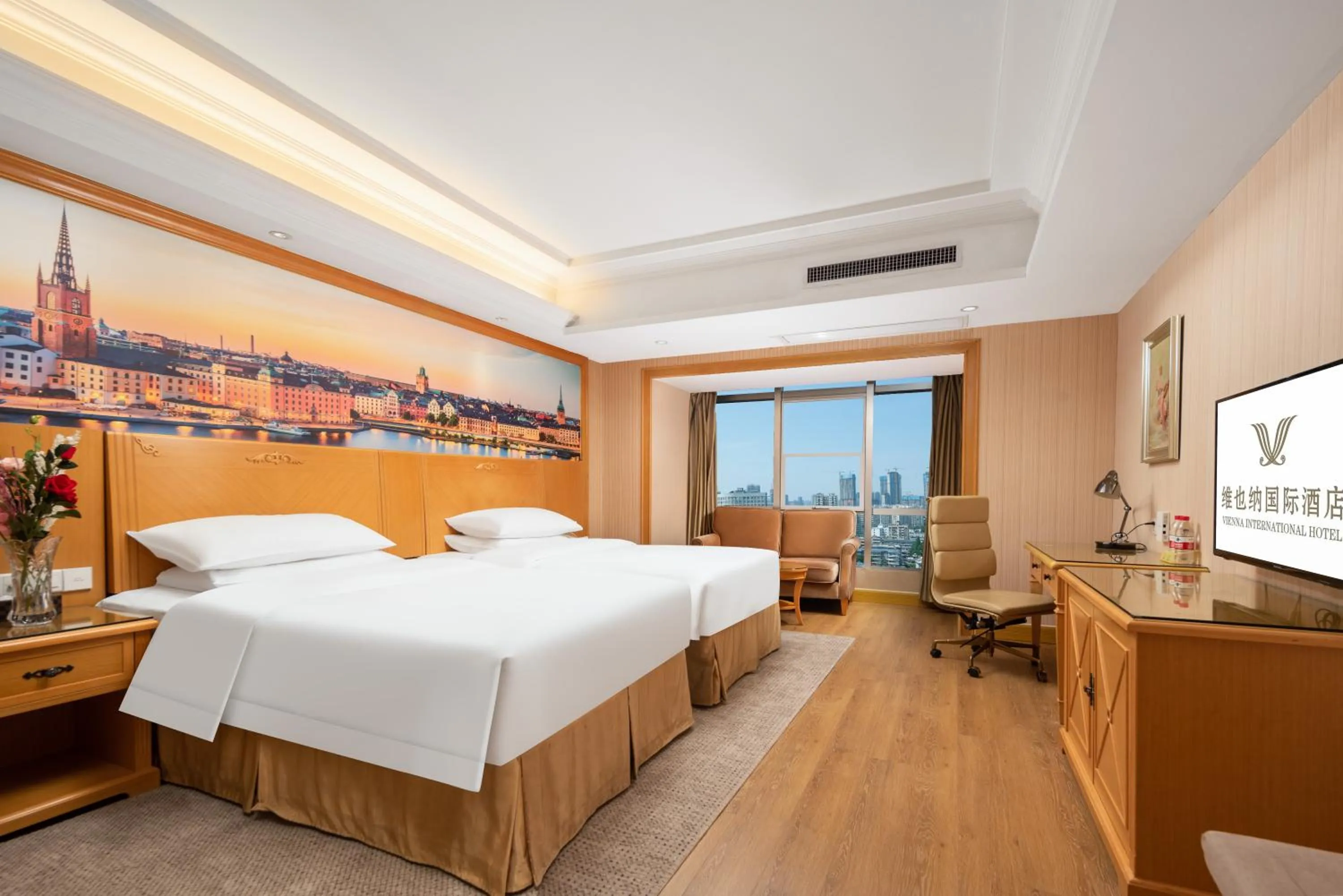 Bed in Vienna International Hotel Wuhan Jiefang Avenue