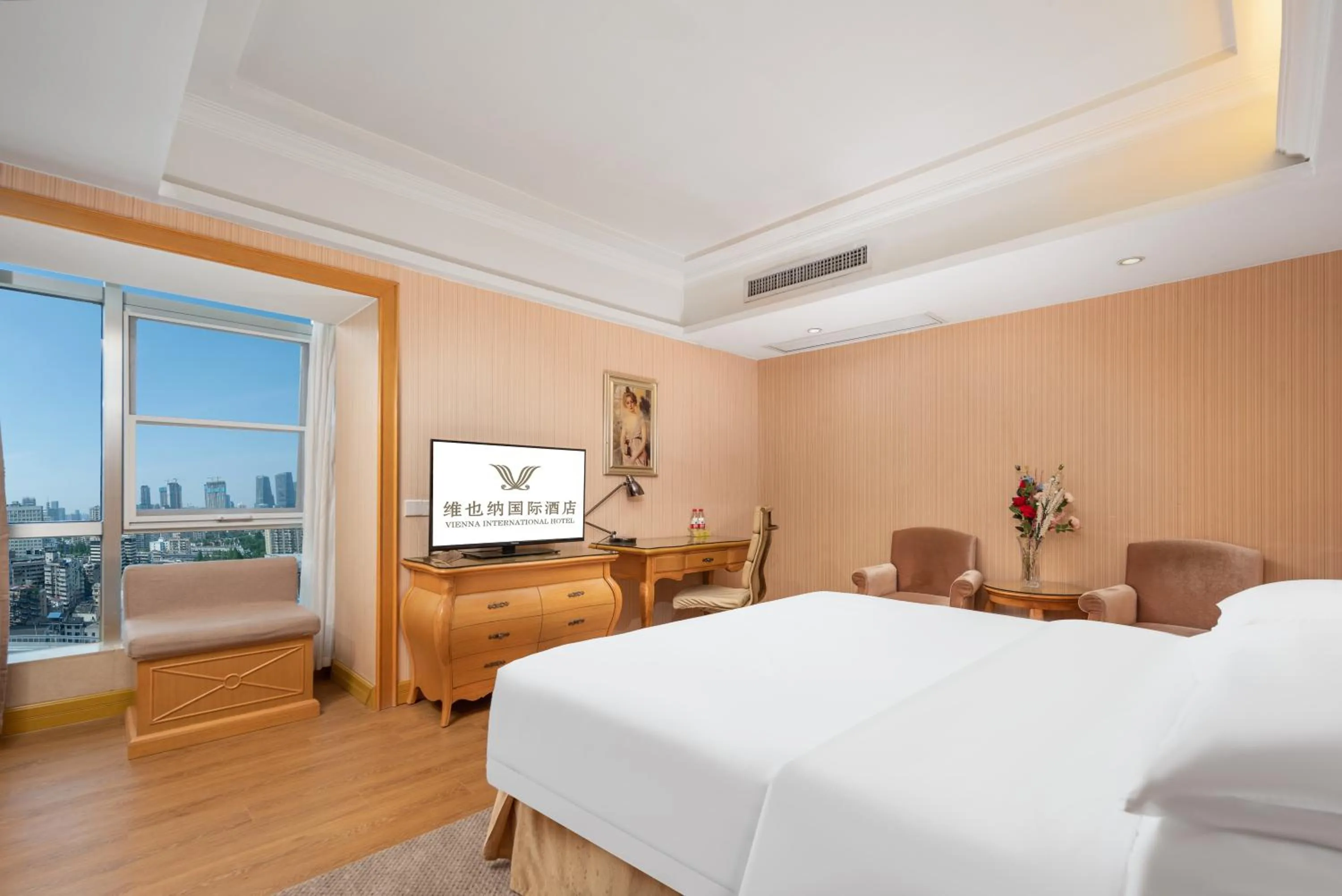 Bed in Vienna International Hotel Wuhan Jiefang Avenue