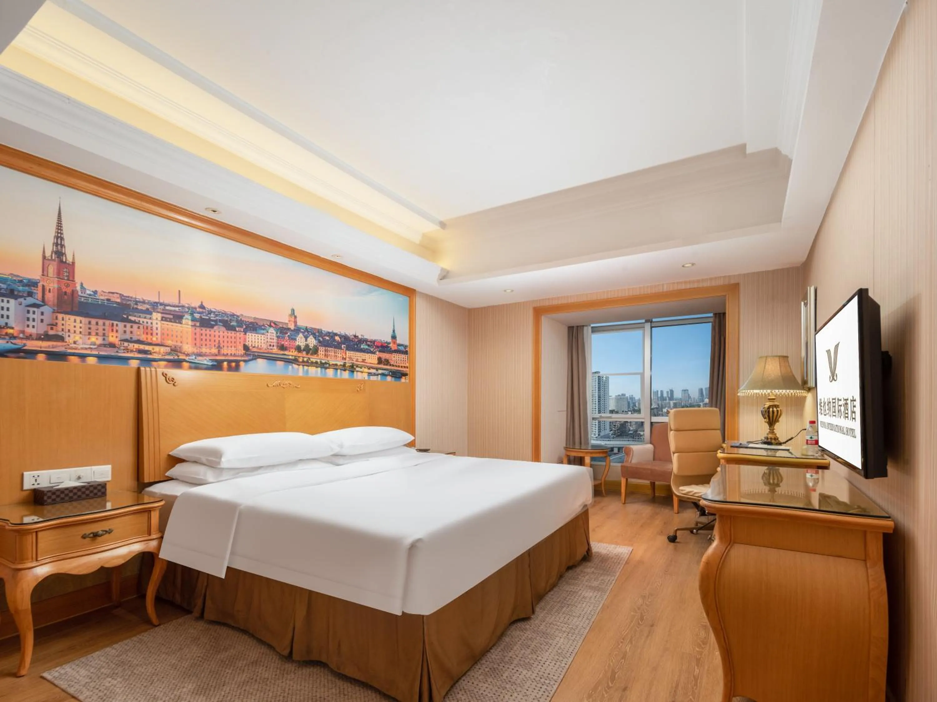 Bed in Vienna International Hotel Wuhan Jiefang Avenue