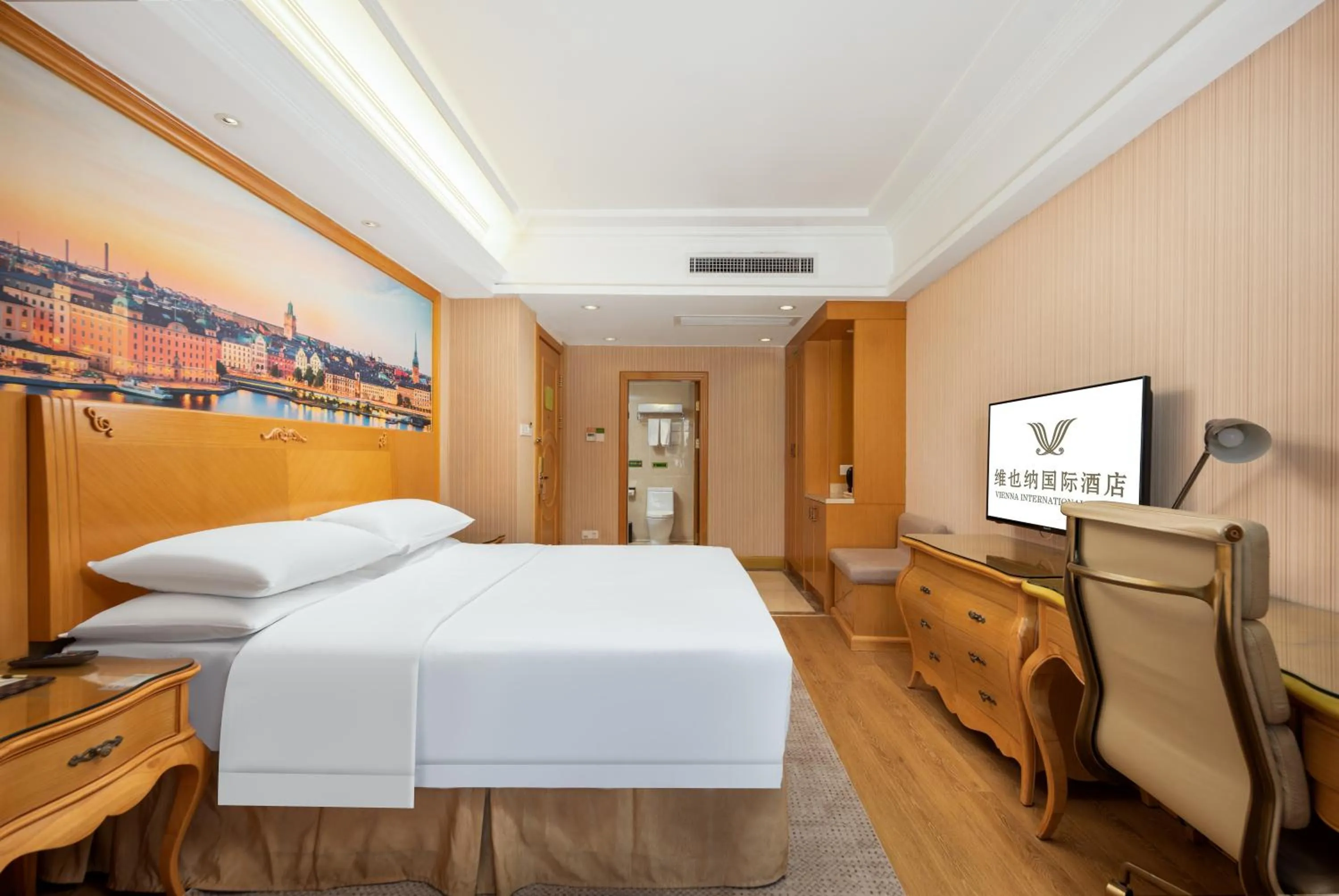 Bed in Vienna International Hotel Wuhan Jiefang Avenue