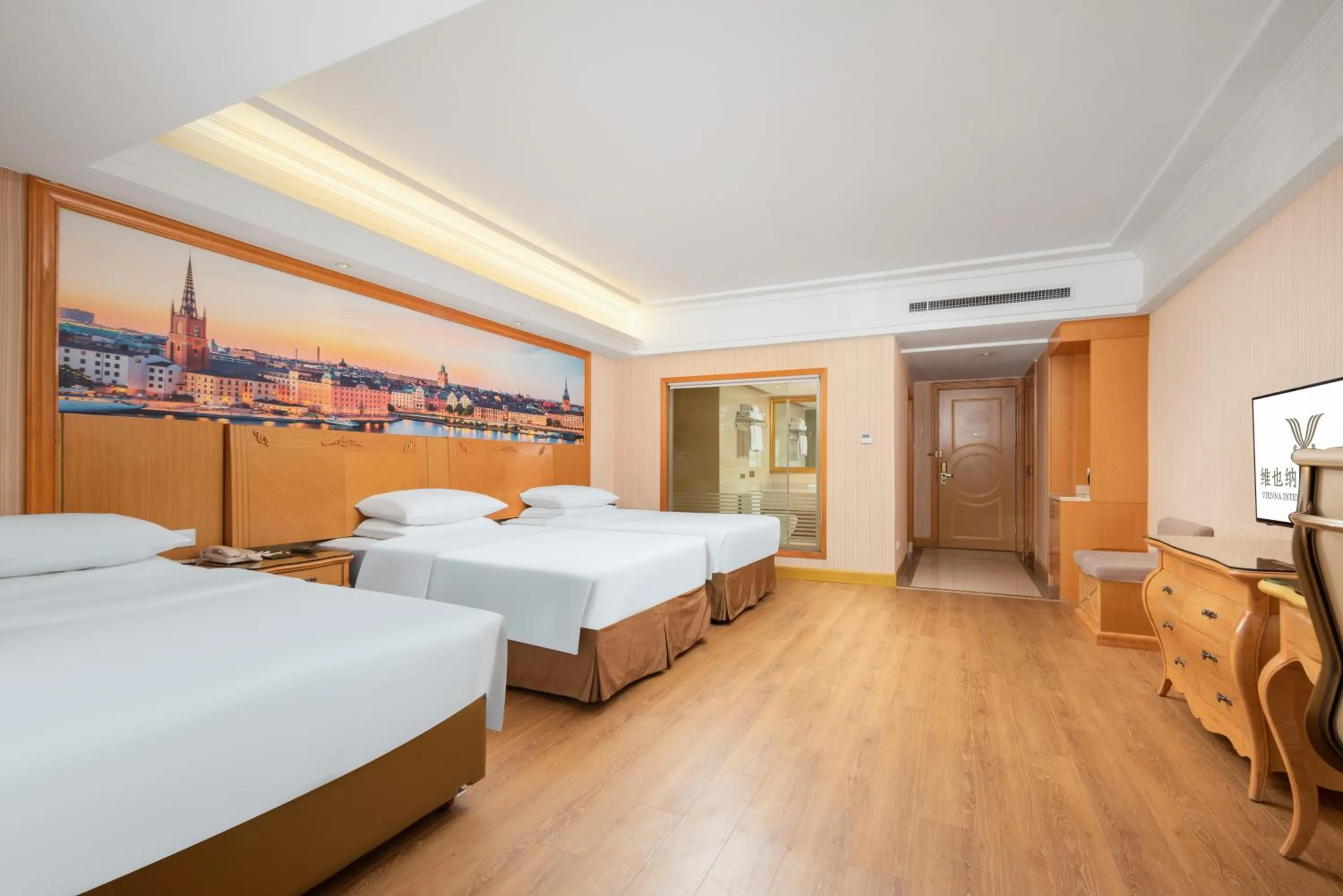 Bed in Vienna International Hotel Wuhan Jiefang Avenue