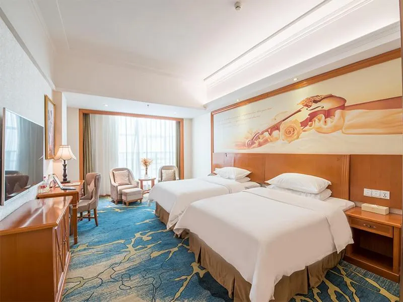 Bed in Vienna Hotel Zhengzhou Airport