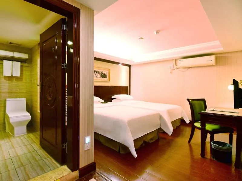 Bed in Vienna Hotel Shenzhen Railway station