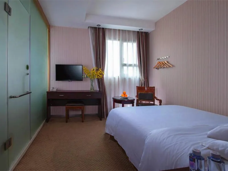 Bed in Vienna Hotel Shenzhen Fenghuang Road