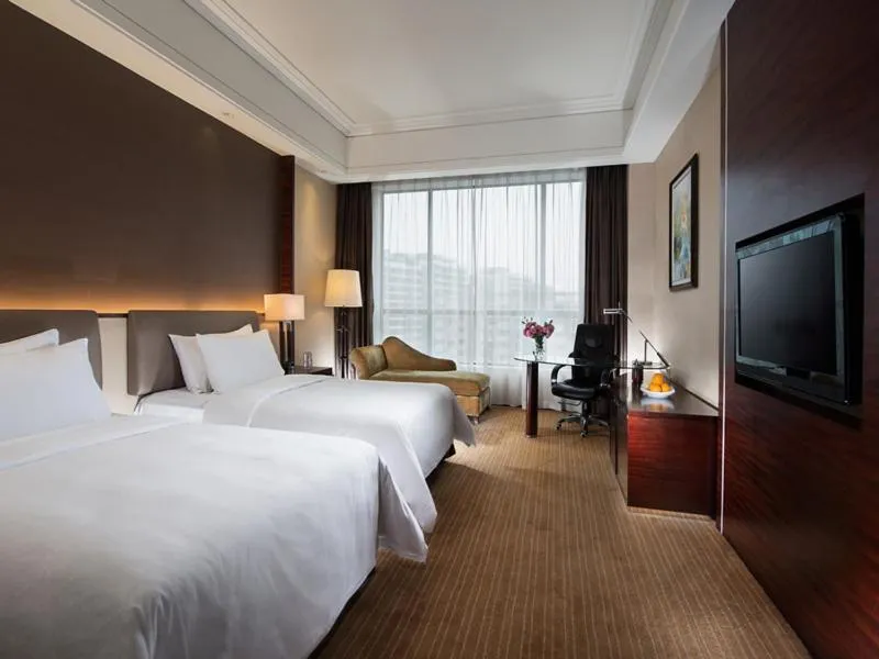 Bed in Vienna Hotel Shenzhen Exibition Center