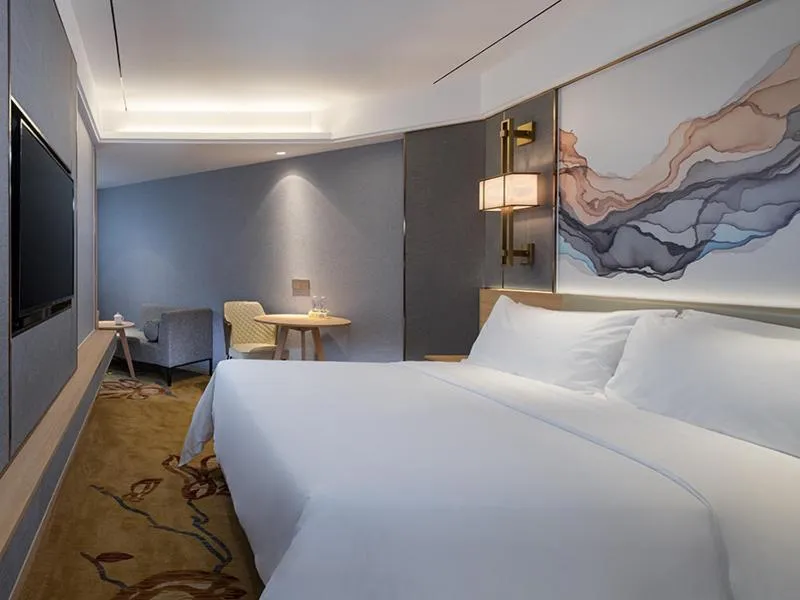 Bed in Vienna Hotel Shenzhen Exibition Center