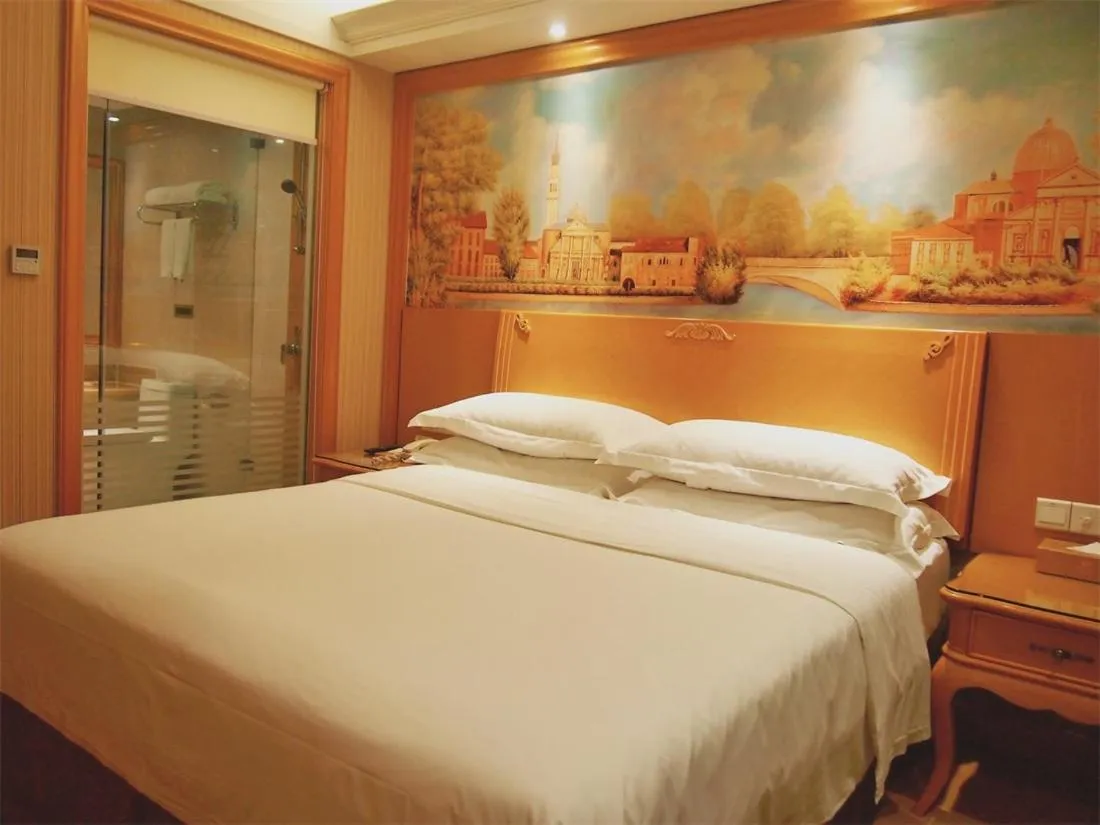 Bed in Vienna Hotel Shenzhen Nanshan Yilida