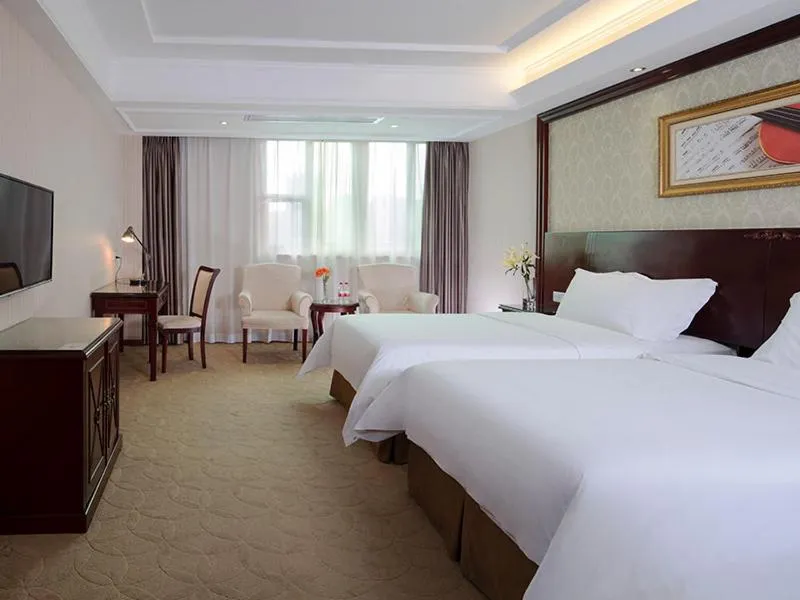 Bed in Vienna Hotel Shenzhen BaoAn Qianjin Road