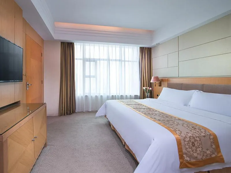 Bed in Vinenna International Hotel Shenzhen shajing
