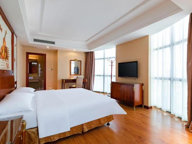 Bed in Vienna Hotel Shenzhen Songgang Shajiang Road