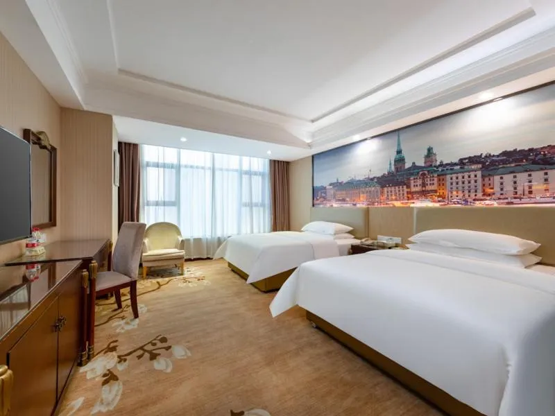 Bed in Vienna Hotel Shenzhen Songgang Shajiang Road