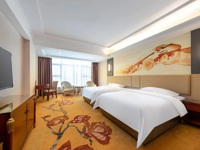 Bed in Vienna Hotel Shenzhen Songgang Shajiang Road