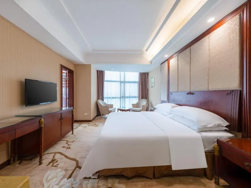 Bed in Vienna Hotel Shenzhen Songgang Shajiang Road