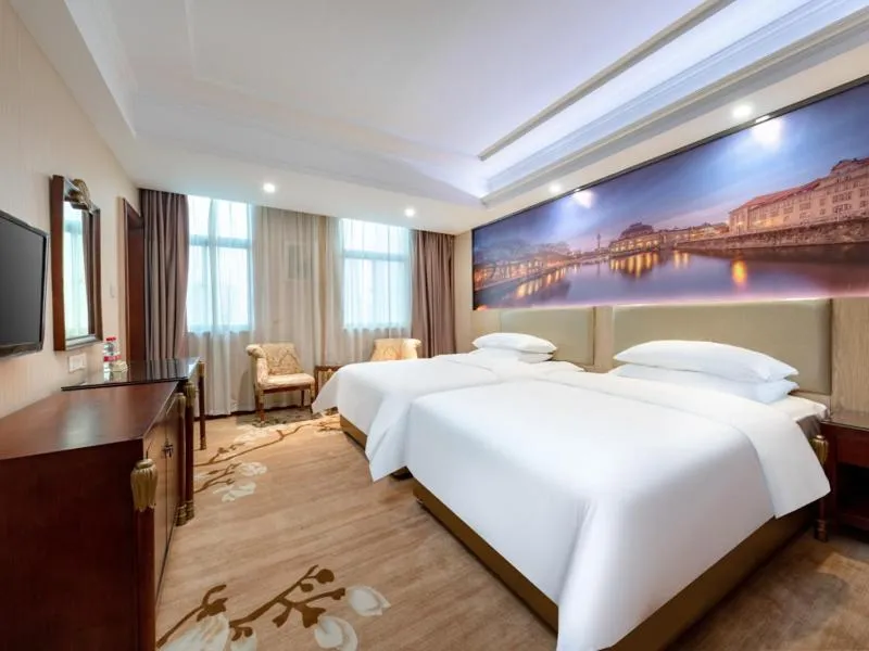 Bed in Vienna Hotel Shenzhen Songgang Shajiang Road