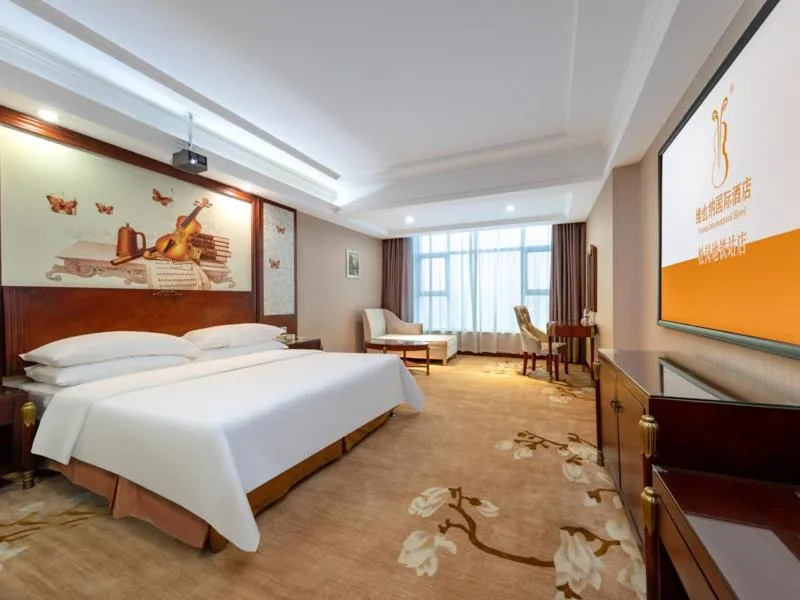 Bed in Vienna Hotel Shenzhen Songgang Shajiang Road