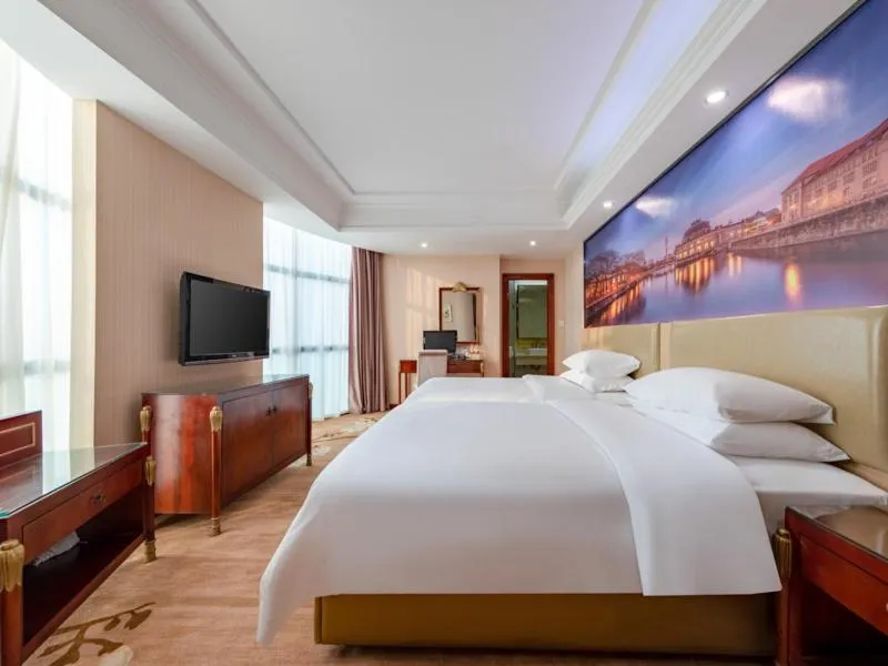 Bed in Vienna Hotel Shenzhen Songgang Shajiang Road