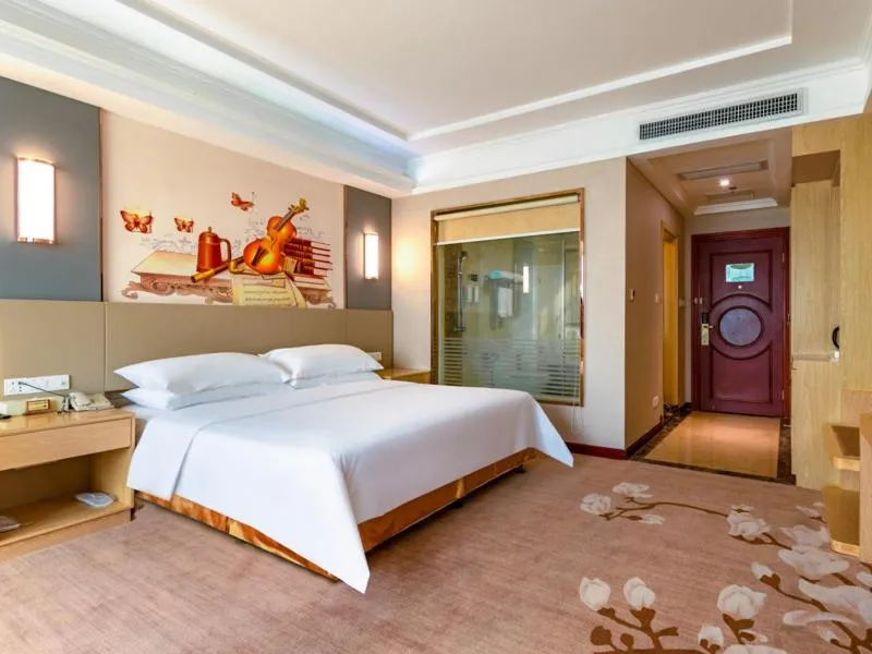 Bed in Vienna Hotel Shenzhen Songgang Shajiang Road
