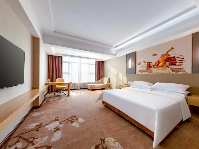 Bed in Vienna Hotel Shenzhen Songgang Shajiang Road