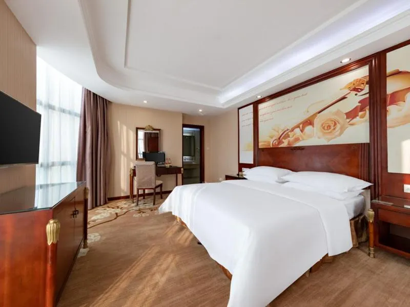 Bed in Vienna Hotel Shenzhen Songgang Shajiang Road