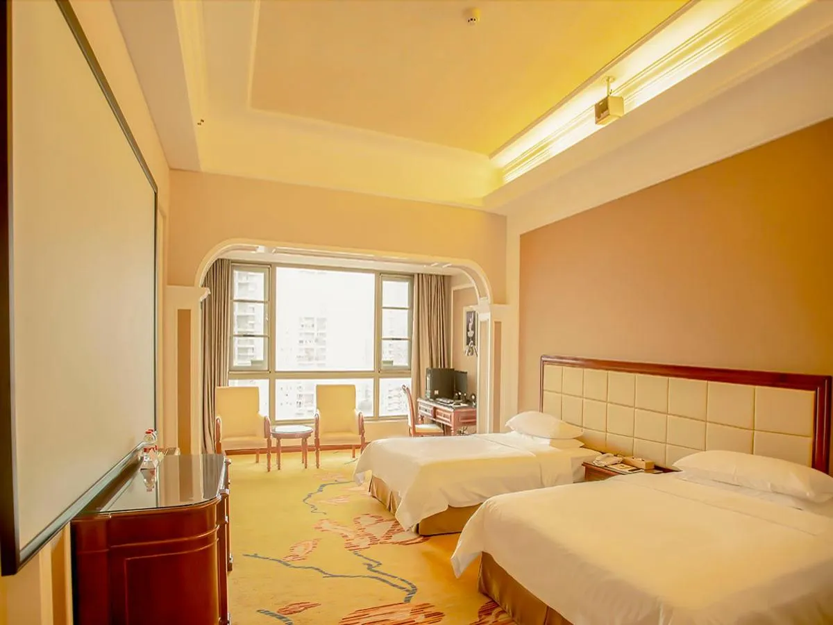 Bed in Vienna Hotel Shenzhen Songgang Liye Road