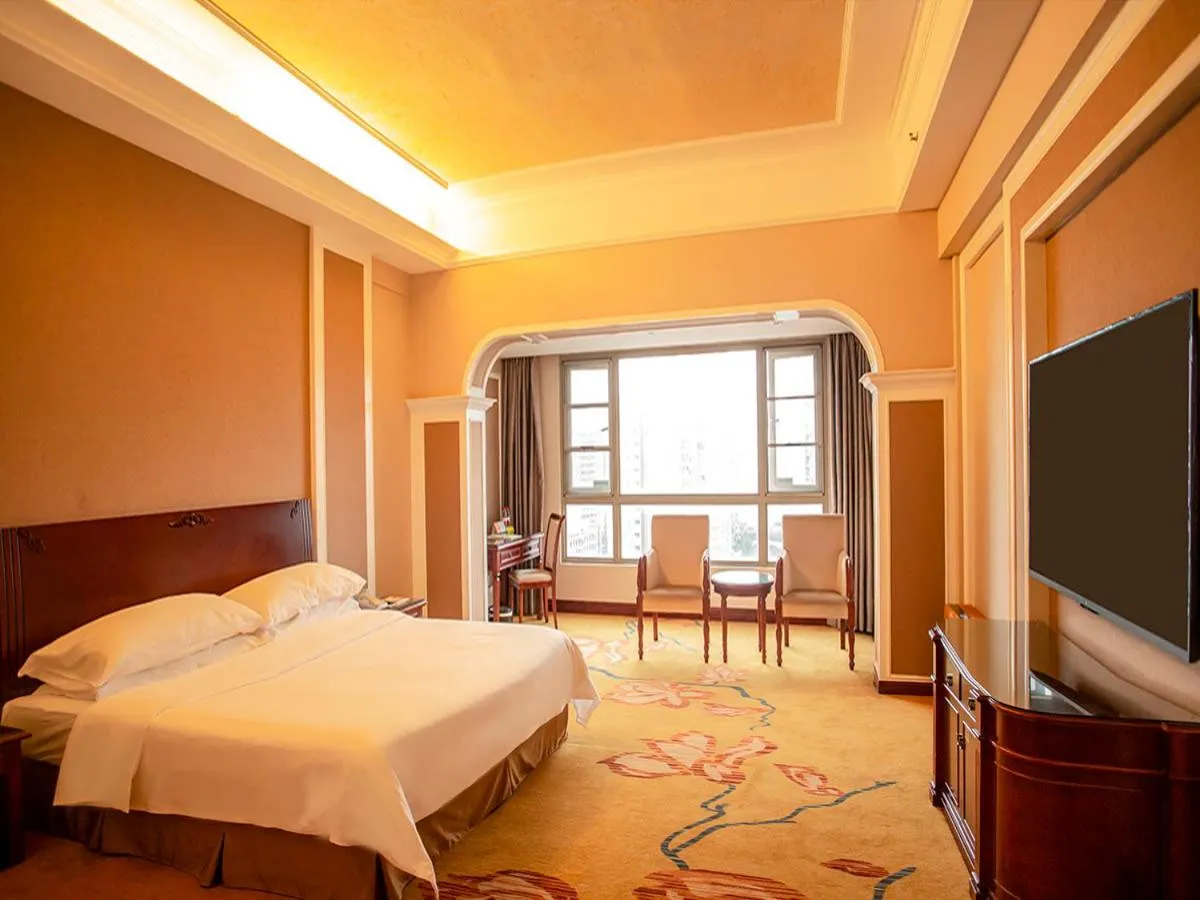 Bed in Vienna Hotel Shenzhen Songgang Liye Road