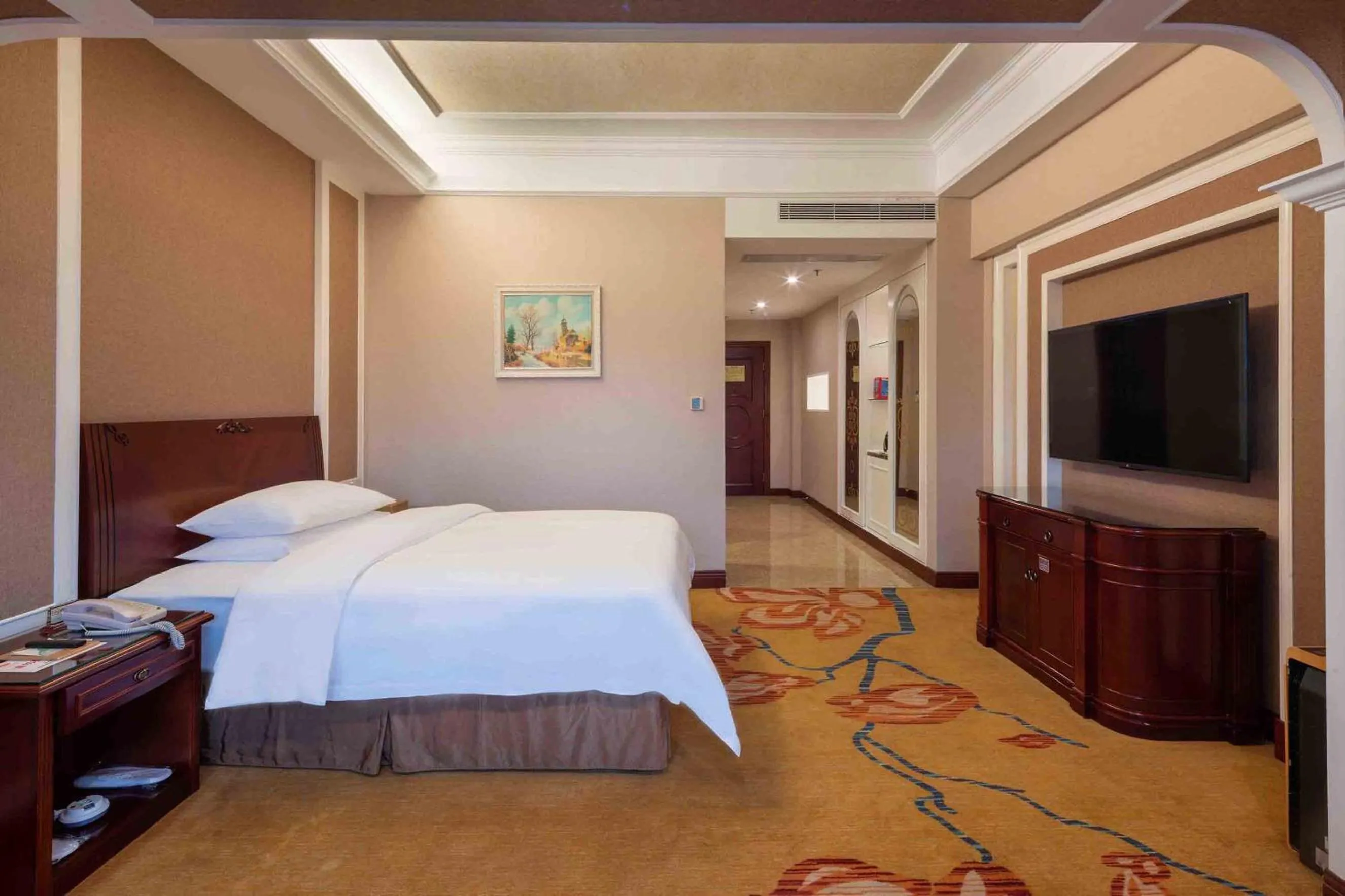 Bed in Vienna Hotel Shenzhen Songgang Liye Road