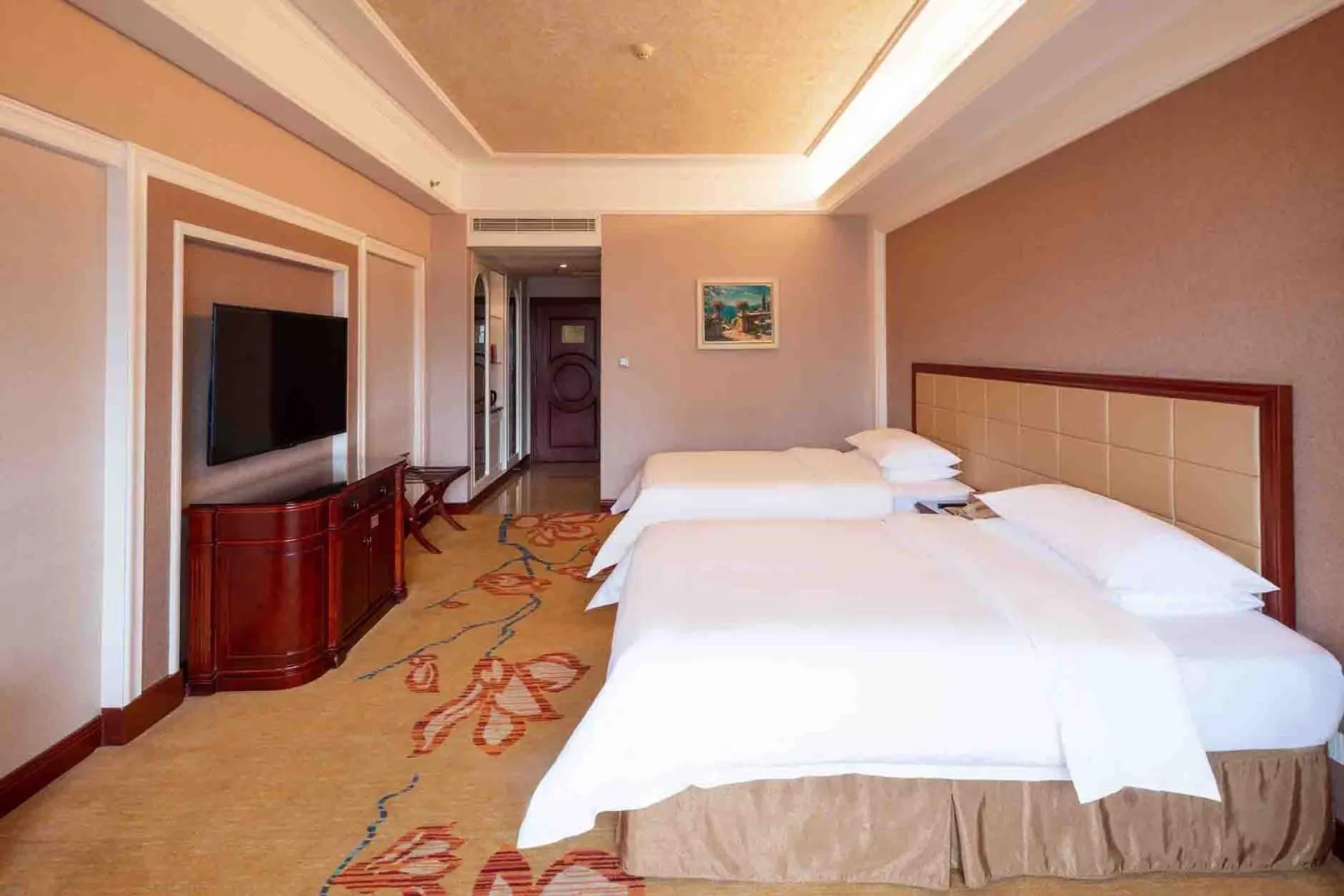 Bed in Vienna Hotel Shenzhen Songgang Liye Road