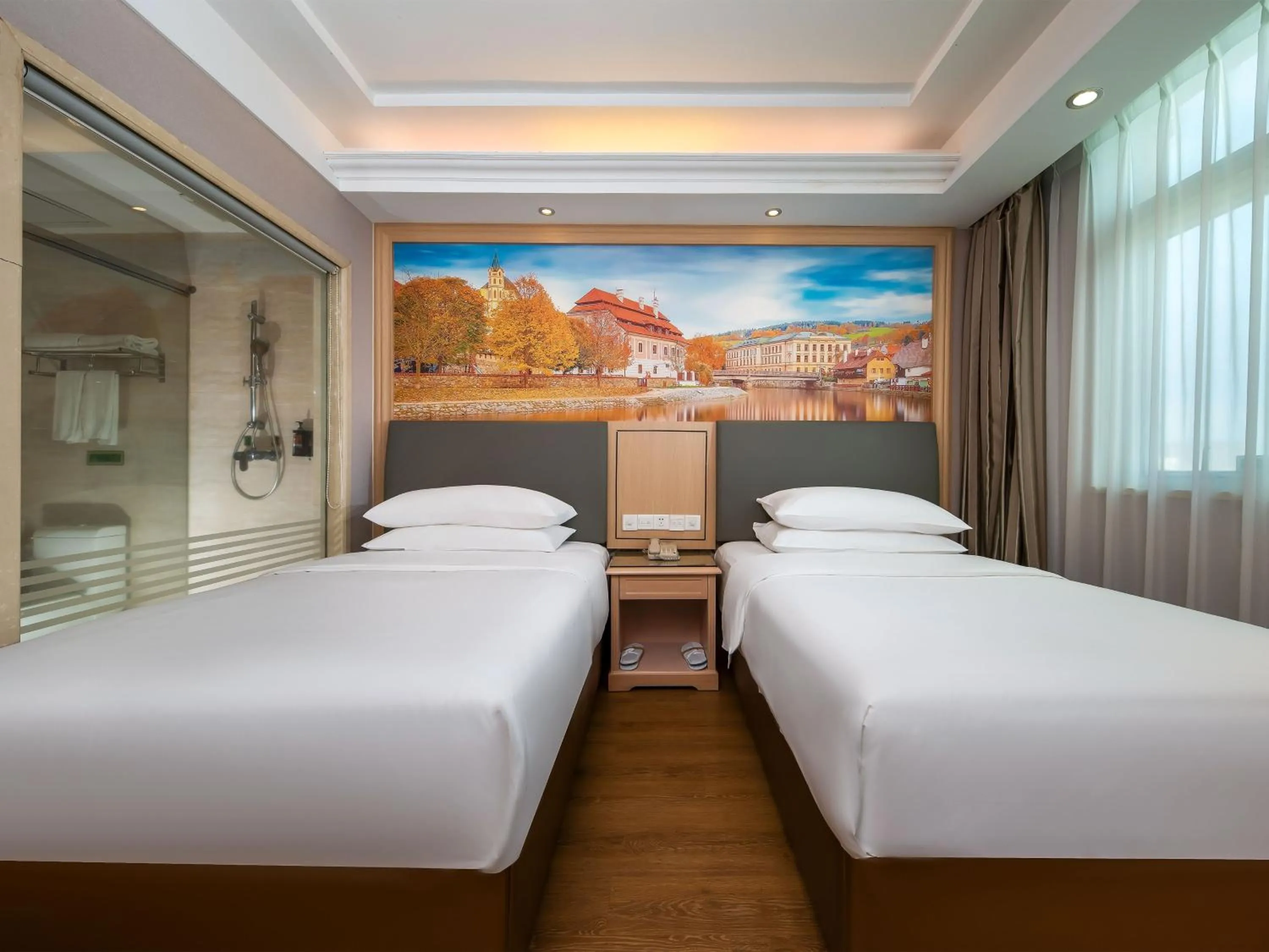 Bed in Vienna Hotel Shenzhen Henggang Cuihu Shangzhuang
