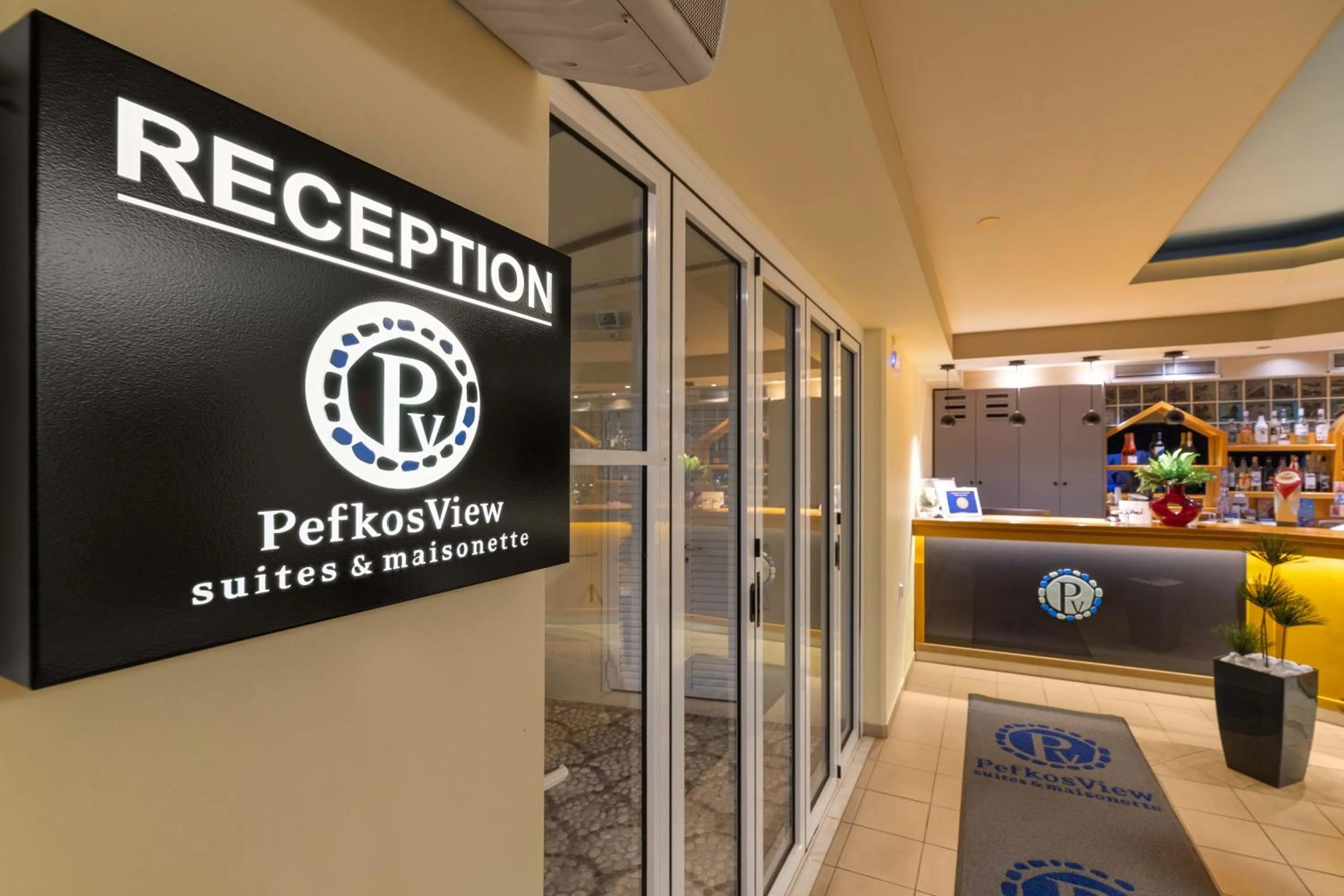 Property logo or sign in Pefkos View Suites & Maisonette