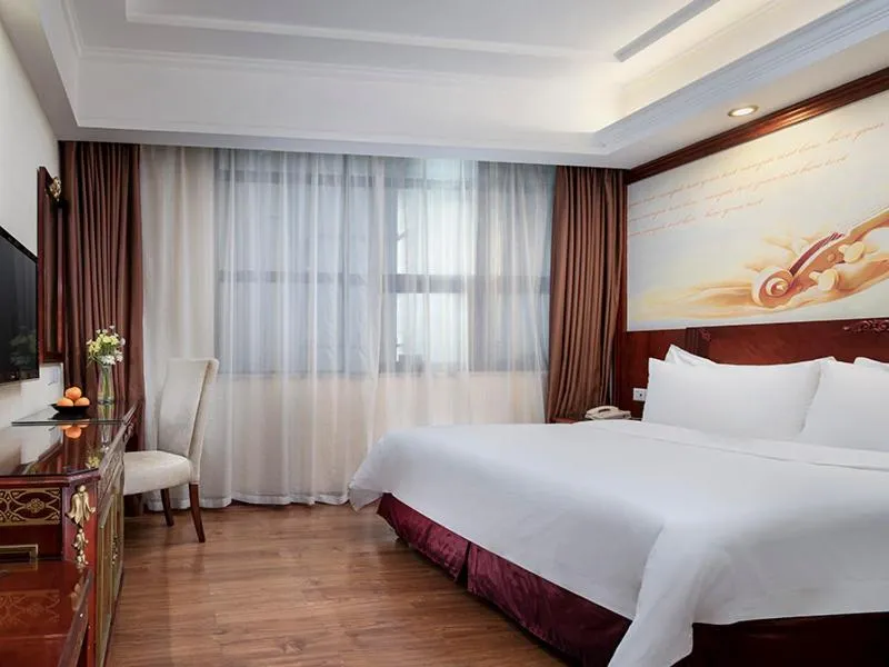 Bed in Vienna Hotel Shenzhen Pingshan Shenshan Road