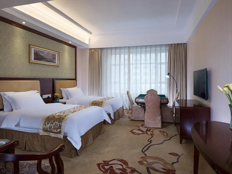 Bed in Vienna Hotel Dongguan Changping Avenue