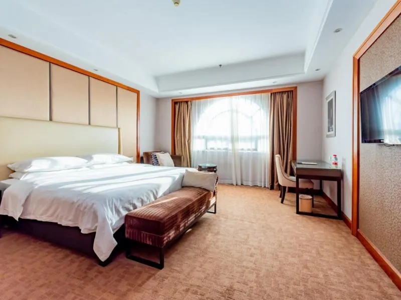 Bed in Vienna Hotel Dongguan Tangxia Binfen Plaza