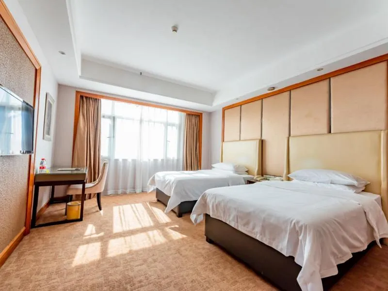 Bed in Vienna Hotel Dongguan Tangxia Binfen Plaza